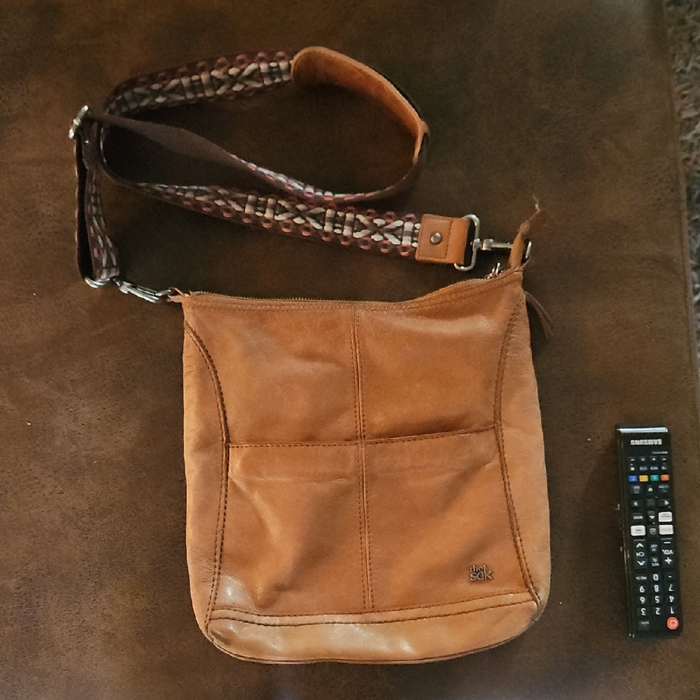 The Sak Tan Leather Messenger Bag with Patterned Strap